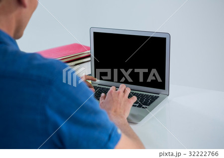 Man using laptop 32222766
