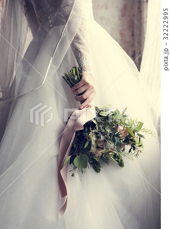 Attractive Beautiful Bride Holding Flowers Bouquet 32222995