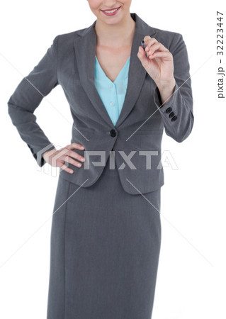 Businesswoman using digital screen 32223447
