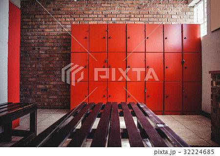 Empty locker room and a bench Empty locker room and a bench 32224685
