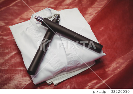 Karate uniform and nunchaku Karate uniform and nunchaku 32226050