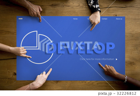 Hands working on network graphic overlay billboard on table 32226812