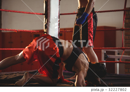 Two female boxers fighting in the ring 32227802