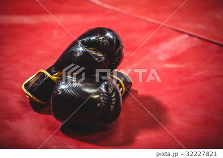 Pair of black boxing gloves 32227821