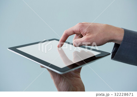 Businessman using digital tablet Businessman using digital tablet 32228671