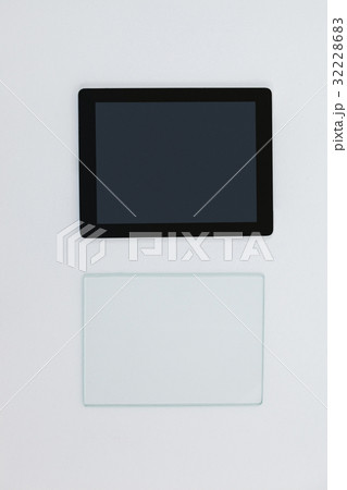 Close-up of digital tablet and glass sheet 32228683