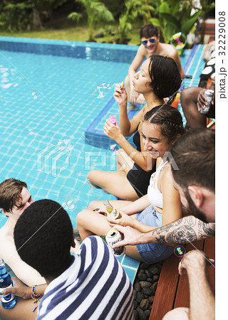 Group of diverse friends enjoying summer time by the pool 32229008