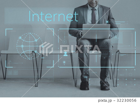 Businessman connected with global communications network 32230056