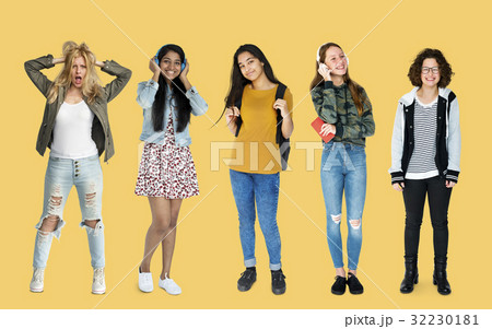 Diverse group of cheerful girls standing in a row 32230181