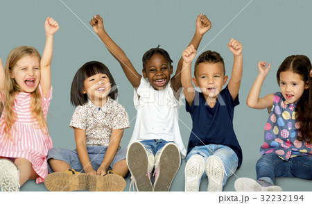 Diverse Group Of Happy Kids Holding Hands Up Diverse Group Of Happy Kids Holding Hands Up 32232194