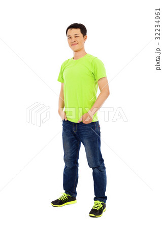 confident young man standing in studio 32234961