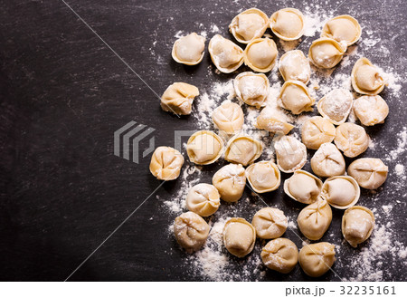 fresh russian pelmeni, ravioli or dumplings 32235161