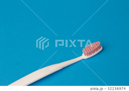 Photo of one pink toothbrush Photo of one pink toothbrush 32236974