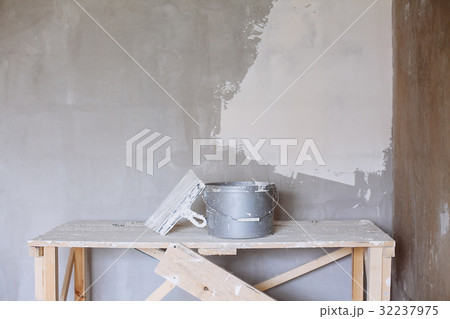 Set of plaster trowel tool, spatula and bucket. Set of plaster trowel tool, spatula and bucket. 32237975