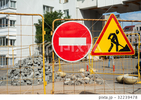 Stop! Repair sidewalk. Work ahead road sign Stop! Repair sidewalk. Work ahead road sign 32239478