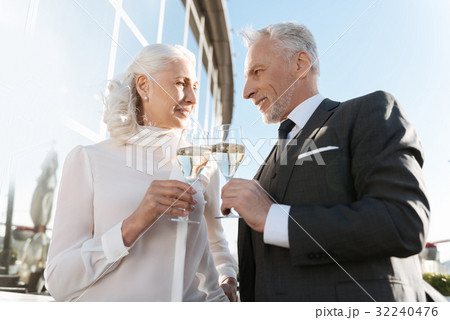 Elegant couple of coworkers looking at each other 32240476