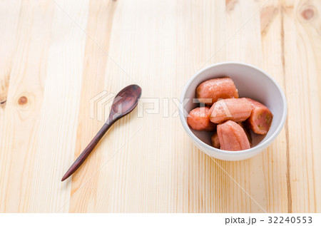 Banana with syrup in white bowl Banana with syrup in white bowl 32240553