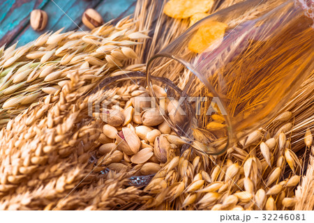Pistachio nuts, peanuts and potato chips for beer 32246081