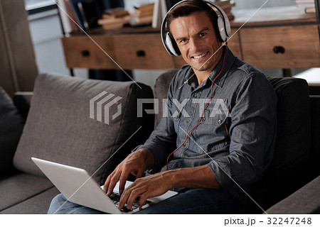 Vibrant ambitious man working on something Vibrant ambitious man working on something 32247248