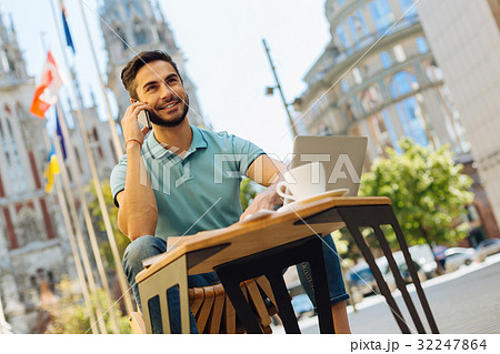 Persuasive energetic man discussing project with a Persuasive energetic man discussing project with a 32247864
