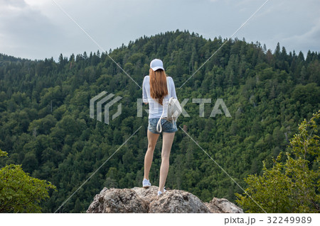 red hair girl on the top of mountain red hair girl on the top of mountain 32249989