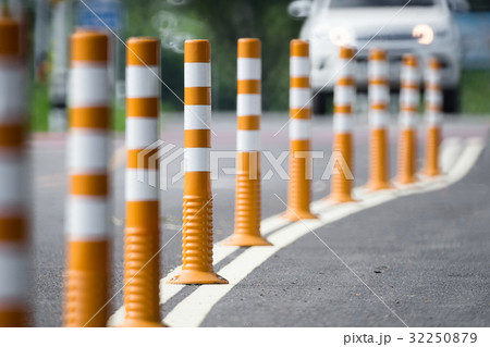 Flexible traffic bollard for bike lane. 32250879