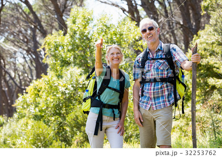 Senior couple standing with their stick 32253762