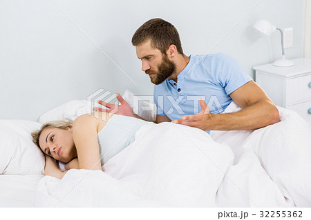 Upset couple arguing with each other 32255362