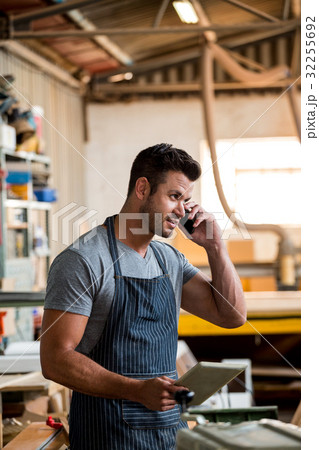 Carpenter on the phone Carpenter on the phone 32255692