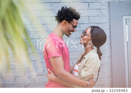 Young couple embracing each other Young couple embracing each other 32256463