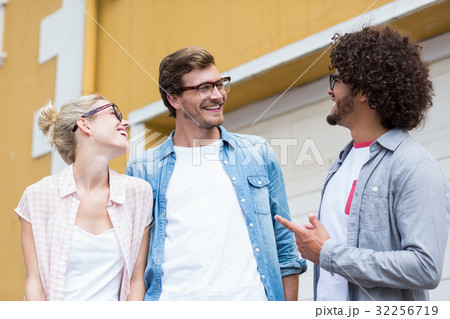 Friends interacting with each other 32256719