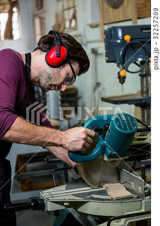 Carpenter working on his craft 32257209