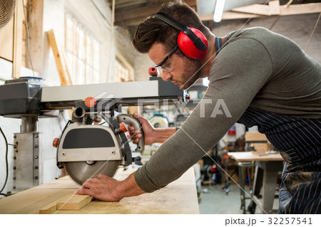 Carpenter working on his craft Carpenter working on his craft 32257541