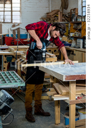 Carpenter working on his craft Carpenter working on his craft 32258934