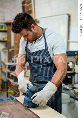 Carpenter working on his craft Carpenter working on his craft 32259079