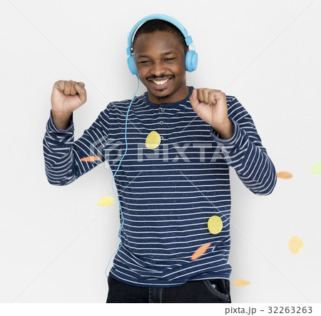 African Man Smiling Happiness Music Entertainment Studio Portrait African Man Smiling Happiness Music Entertainment Studio Portrait 32263263