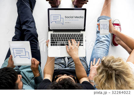 People working on digital device and laptop network graphic overlay People working on digital device and laptop network graphic overlay 32264022