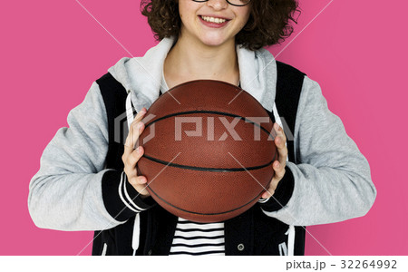 Young Adult Woman with Basketball Studio Portrait 32264992