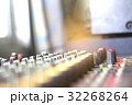 Blur the audio mixer in the recording room. 32268264