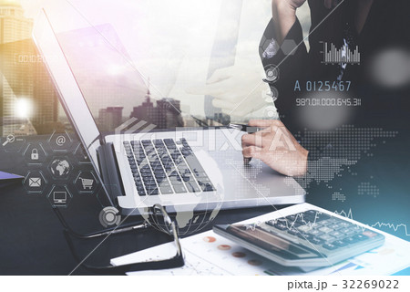 business working on laptop with Finance Trading business working on laptop with Finance Trading 32269022