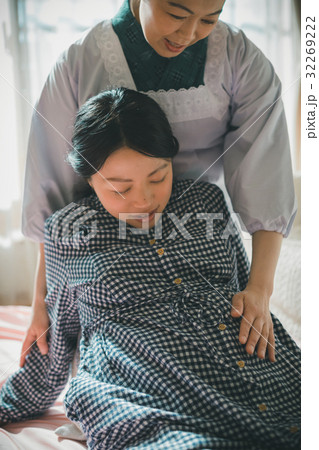 woman during pregnancy or shortly after childbirth woman during pregnancy or shortly after childbirth 32269222
