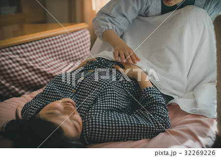 woman during pregnancy or shortly after childbirth 32269226