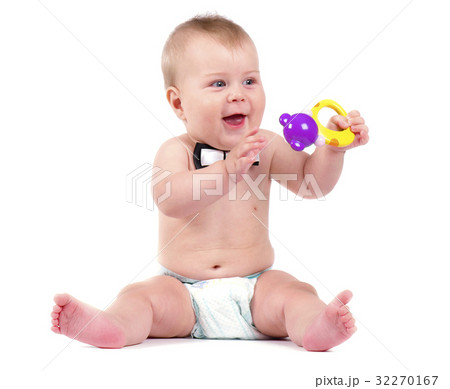 Cute cheerful crawling baby boy with a toy 32270167