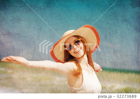 woman standing on seacoast woman standing on seacoast 32273689