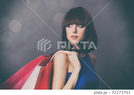 woman with colorful shopping bags 32273701