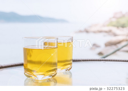 Two glasses of juice 32275323