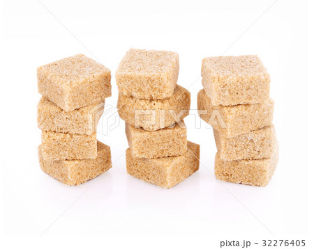 Natural sugar cubes on white background Natural sugar cubes on white background 32276405