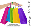 Woman Hand Holding Colorful Shopping Bag 32276539