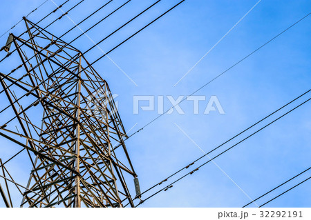 Close up view of high voltage tower with cables Close up view of high voltage tower with cables 32292191