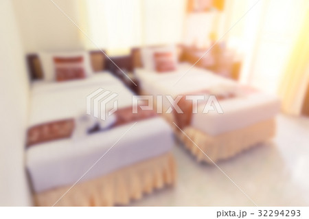 blur hotel bed bedroom double bed white clean hotel room for background. 32294293